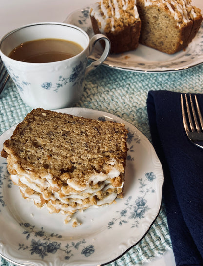A Slice of Banana Bread with Graham Cracker Streusel & Vanilla Glaze