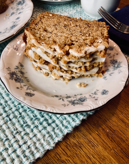 A Slice of Banana Bread with Graham Cracker Streusel & Vanilla Glaze